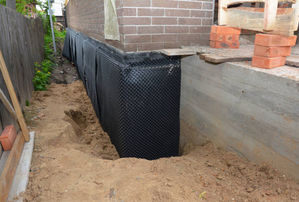 Happy homeowners after waterproofing job in Elizabethton